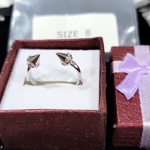 Size 8 ring with crystals on tip